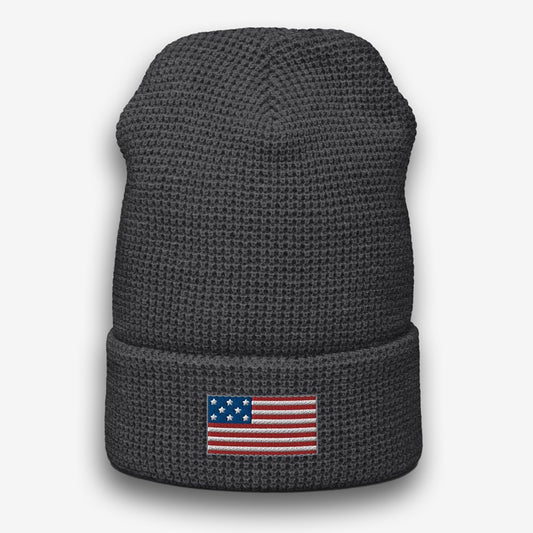  Embrace the American spirit with our 'American Pride Waffle Knit Embroidered Beanie'. Made for those who want to express their national pride, this beanie combines warmth, comfort, and patriotism. The puff embroidered US flag stands out on soft, durable waffle knit fabric. Perfect for any patriot's collection. Shop now and wear your pride on your sleeve—or in this case, on your head!