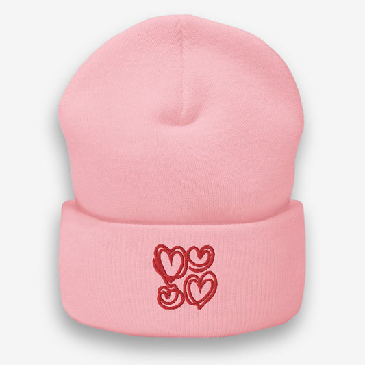  Find the perfect expression of love with our 'Cherished Hearts Embroidered Pink Beanie'. This delightful beanie, featuring whimsical heart embroidery, combines warmth and style for an affectionate touch to any ensemble. Perfect for gifting or as a treat for yourself. Shop now and fall in love with your new favorite accessory!