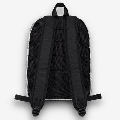 Rear view of a backpack with black straps and a black-and-white geometric pattern on the edges.