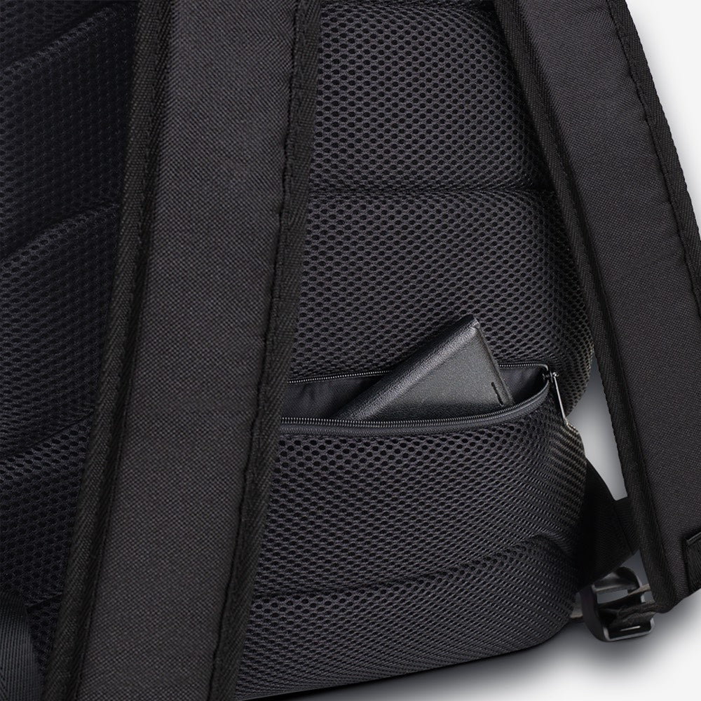 Detailed view focusing on the backpack’s zipper with a contrasting ribbon pattern, showcasing the bag's craftsmanship.