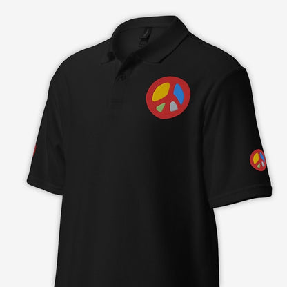 Unisex black polo shirt with peace sign embroidery on left chest close-up