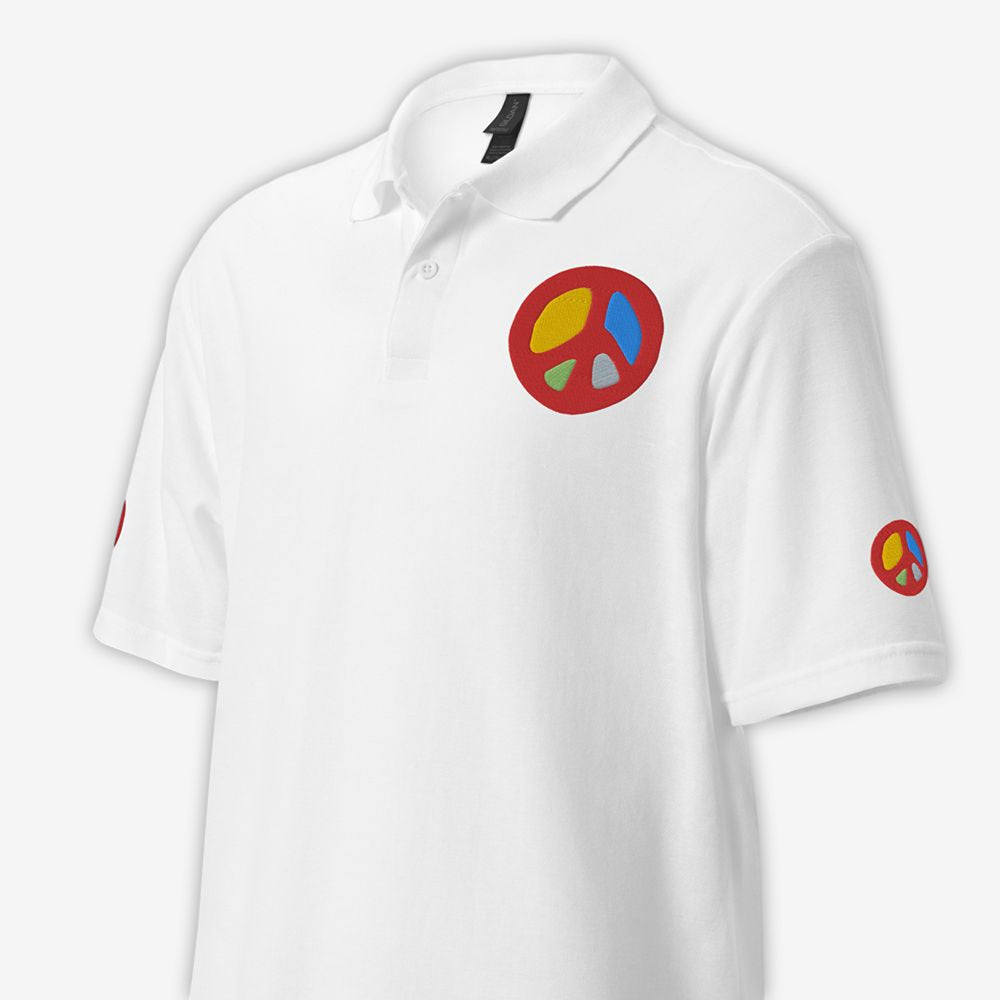 Unisex white polo shirt with peace sign embroidery on left chest close-up