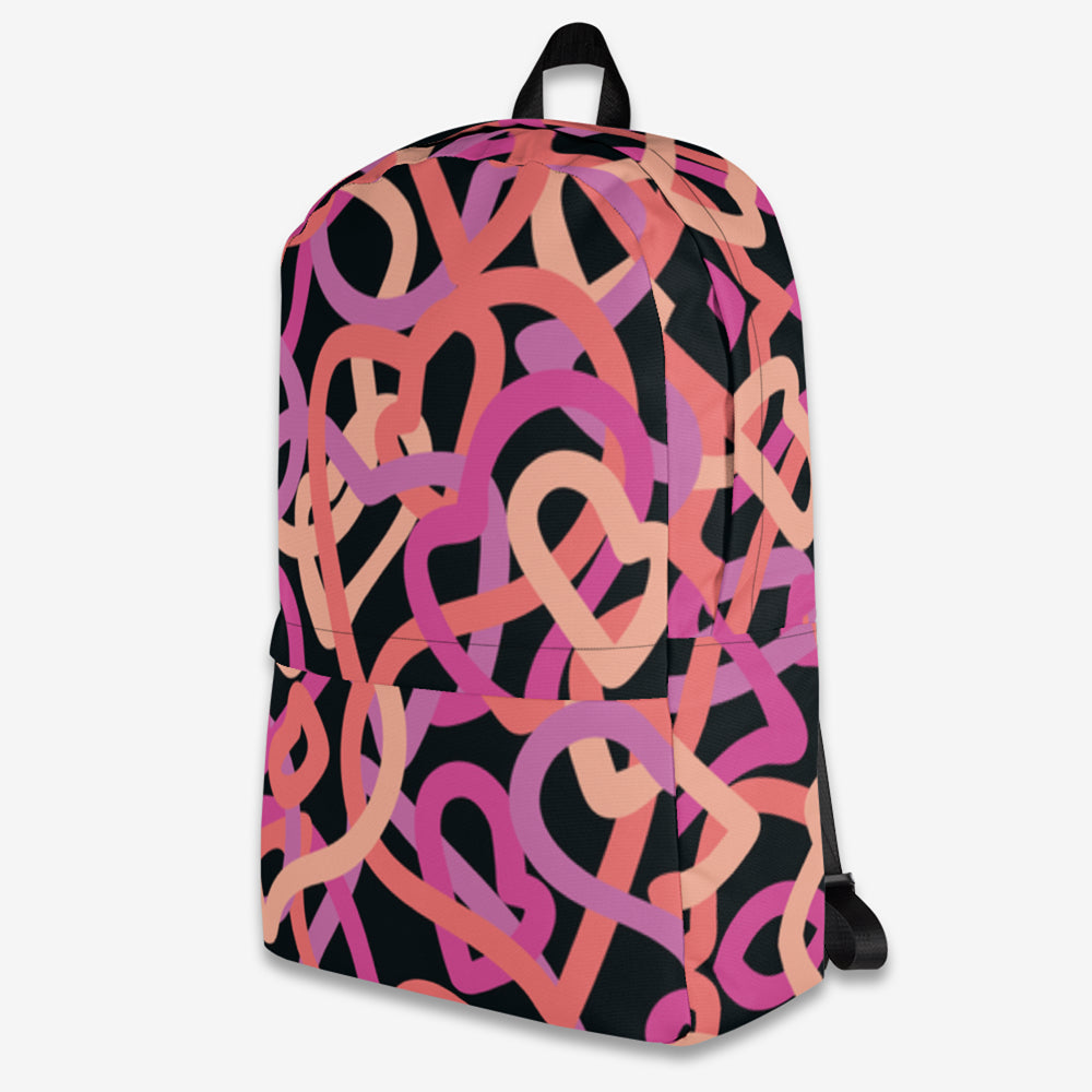 Abstract heartline pattern in pink and purple on backpack's left side