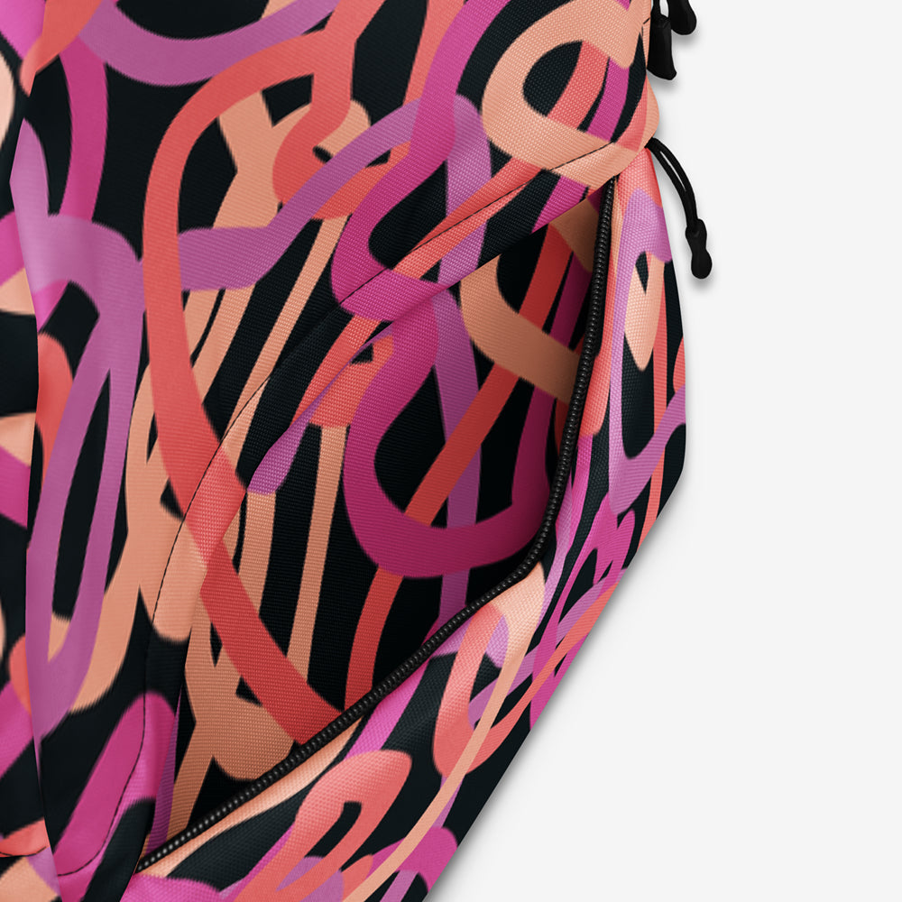 Detailed view of the backpack's front zipper with heartline abstract design