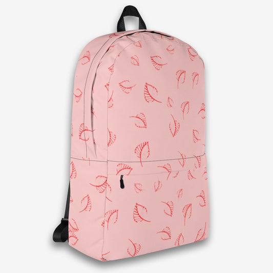 Close-up image of the mesh padding on the back of a pink backpack with black straps, emphasizing the comfort and breathability of the design.