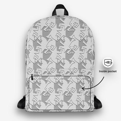 Front view of a backpack with a black-and-white geometric pattern and an inner pocket indicated by an arrow.