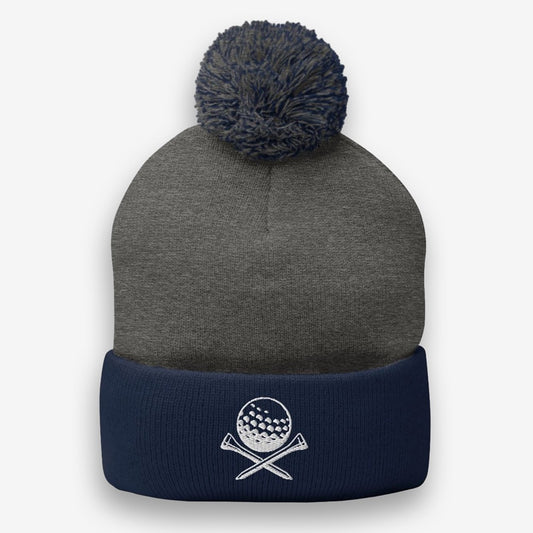  Stay cozy and look the part with our 'Ace Golfer Pom-Pom Embroidered Beanie'. This trendy beanie, with a unique golf ball and clubs embroidery, is the perfect blend of style and warmth for golf enthusiasts. Made for comfort and designed to impress, it's the ideal golfer's companion. Add it to your gear today and enjoy both function and fashion on the greens!