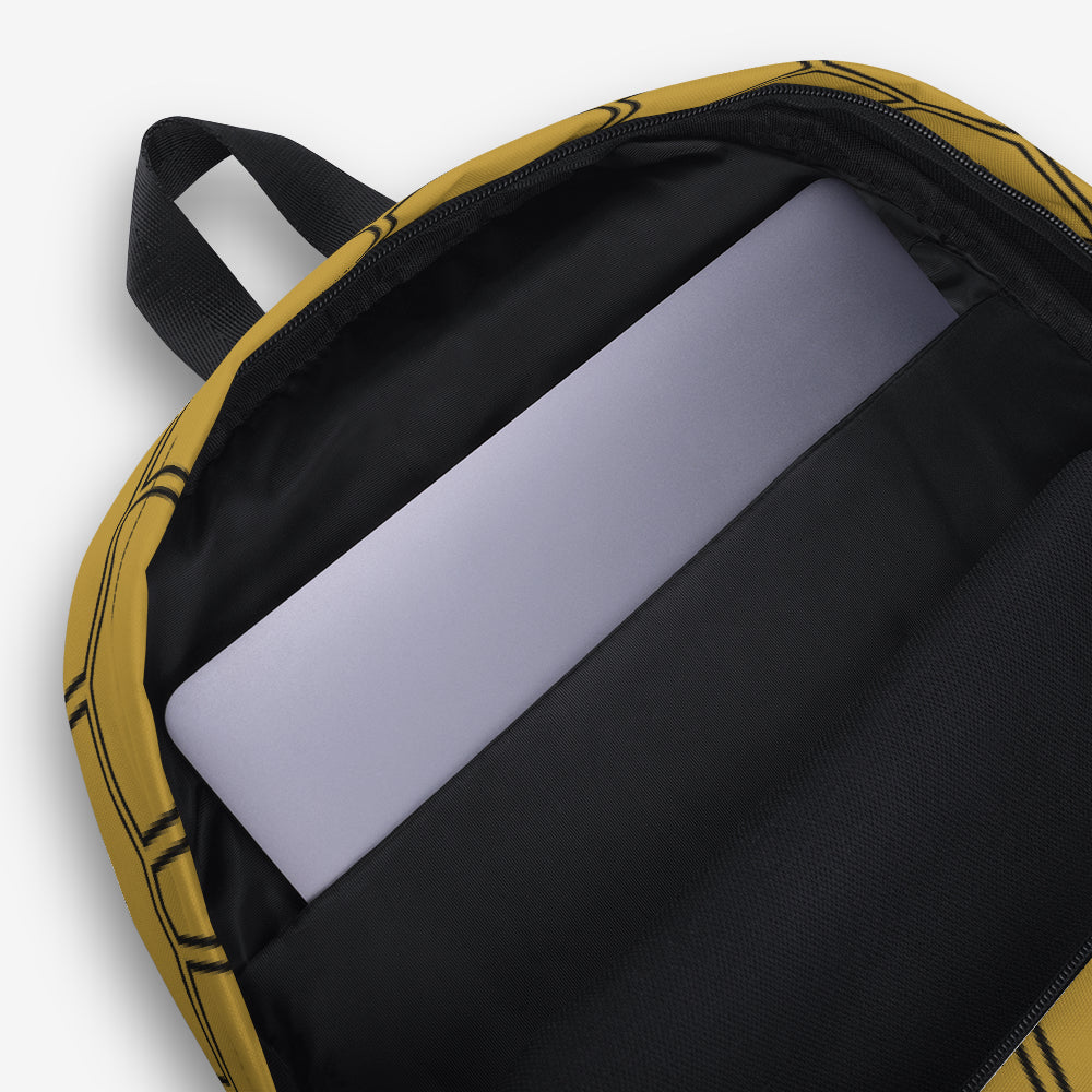 Interior view of the yellow honeycomb backpack with an open main compartment revealing a laptop sleeve.