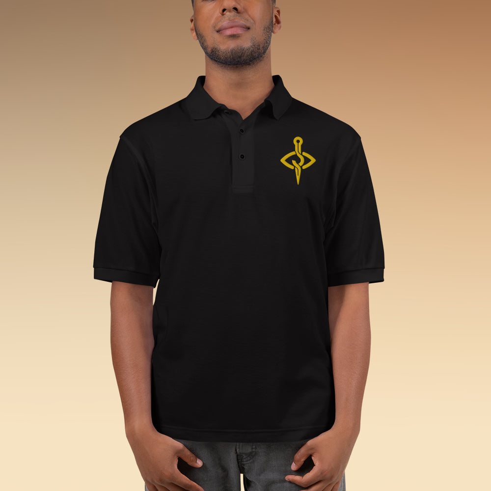 Model wearing a Stitch Art Embroidered Polo in silver with a distinctive needle and thread logo, showcasing a blend of style and craftsmanship. front view balck color on male model.