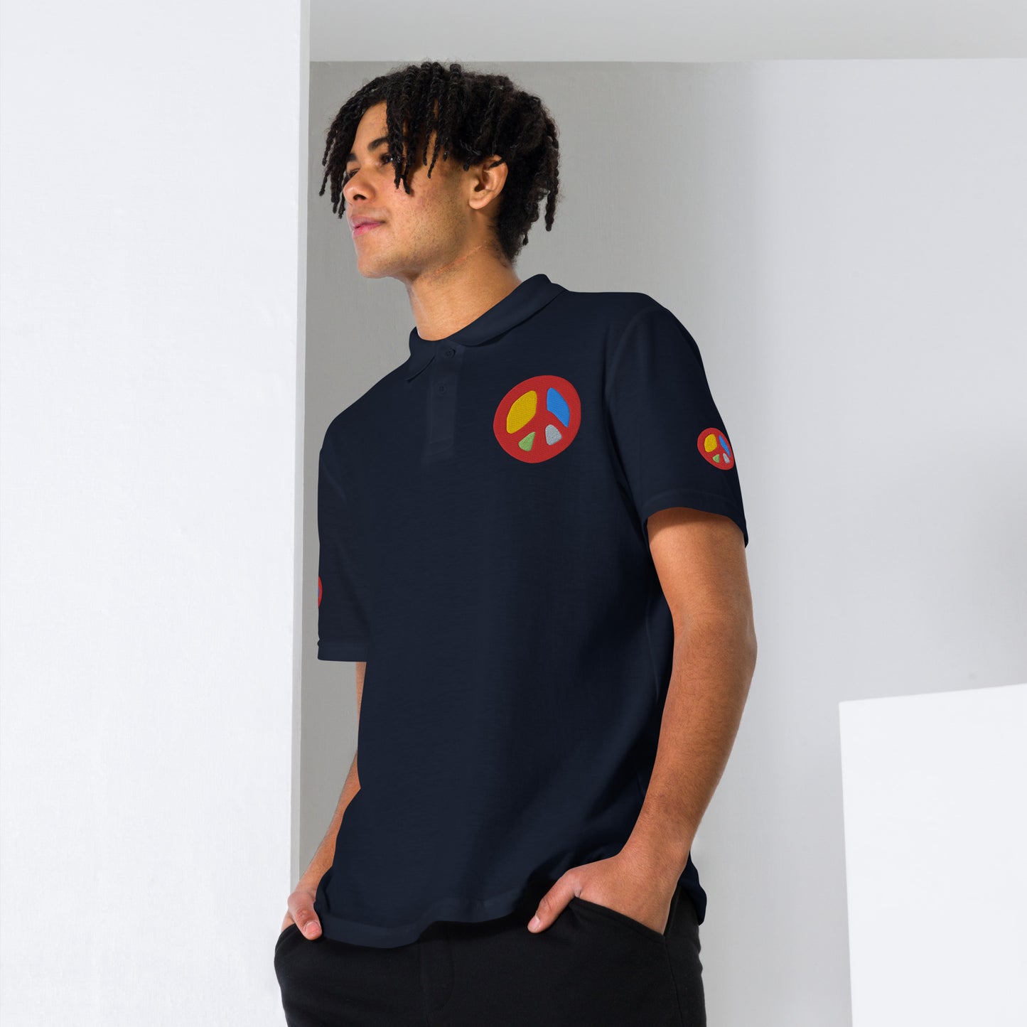 Unisex navy polo shirt with peace sign embroidery front view.